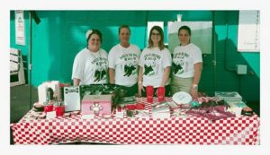 Sporting Bark in the Park Shirts at the TNC table.